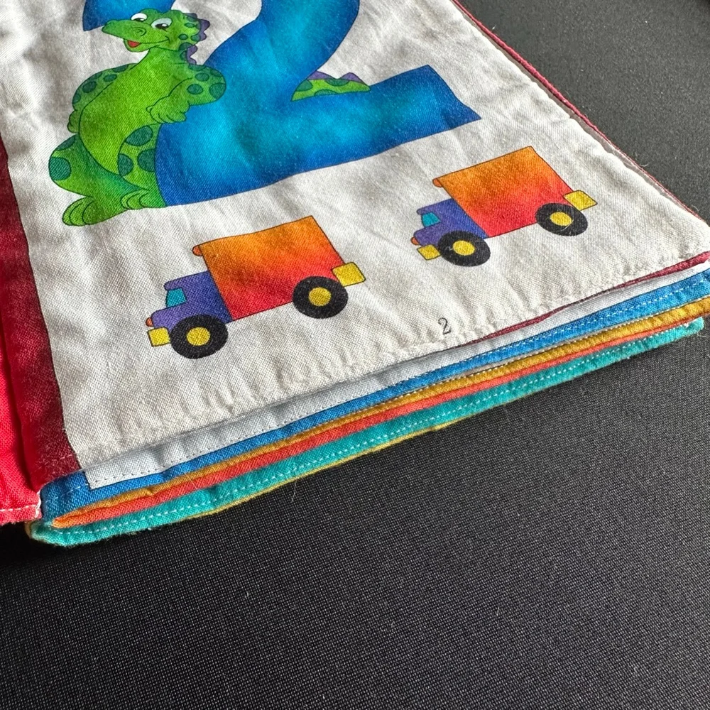 Dexter the Dinosaur Learning Toy Yellow Green cloth book